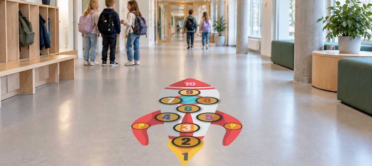 Rakett paradis-gulvfolie – paradislek med rakettmotiv på skolegulvet